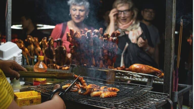 People watching barbecue