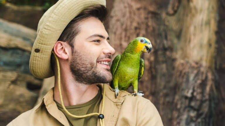 man with a pet bird