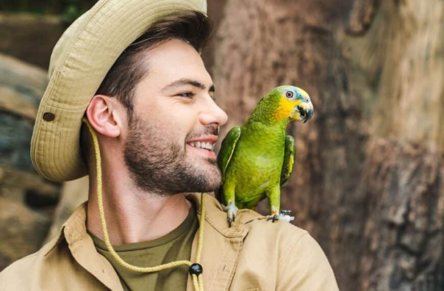 man with a pet bird