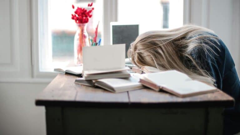 Girl sleeping on desk